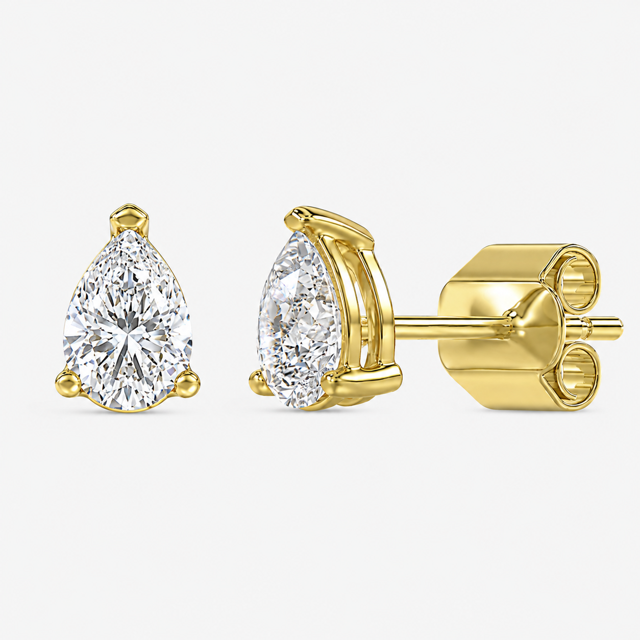 Lumière Pear Diamond Studs