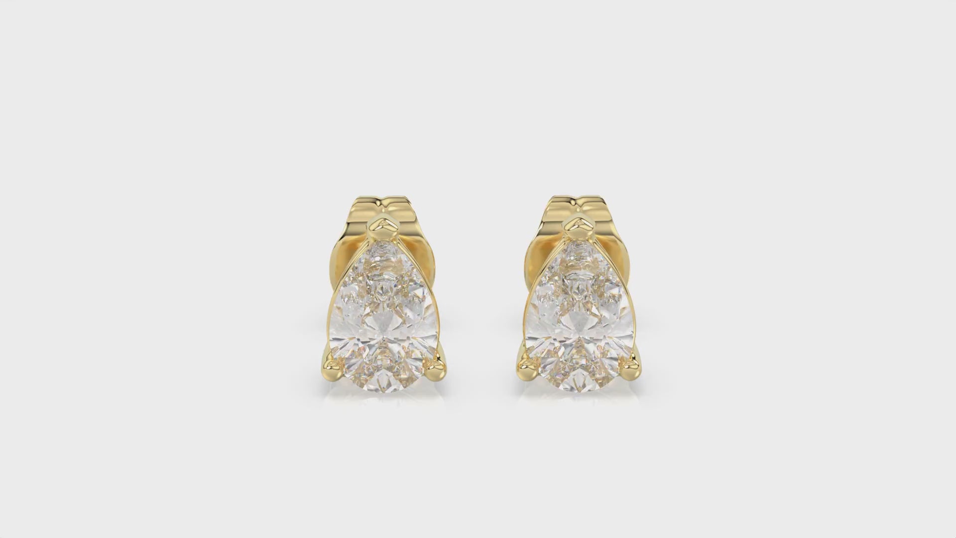 Lumière Pear Diamond Studs